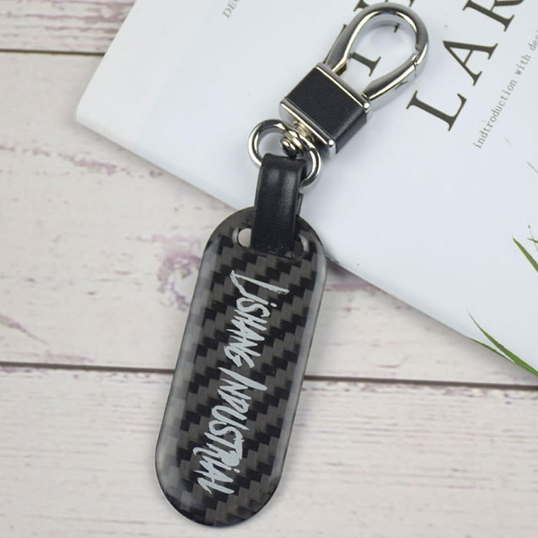 New key tag & dog tag | made of “black gold” carbon fiber